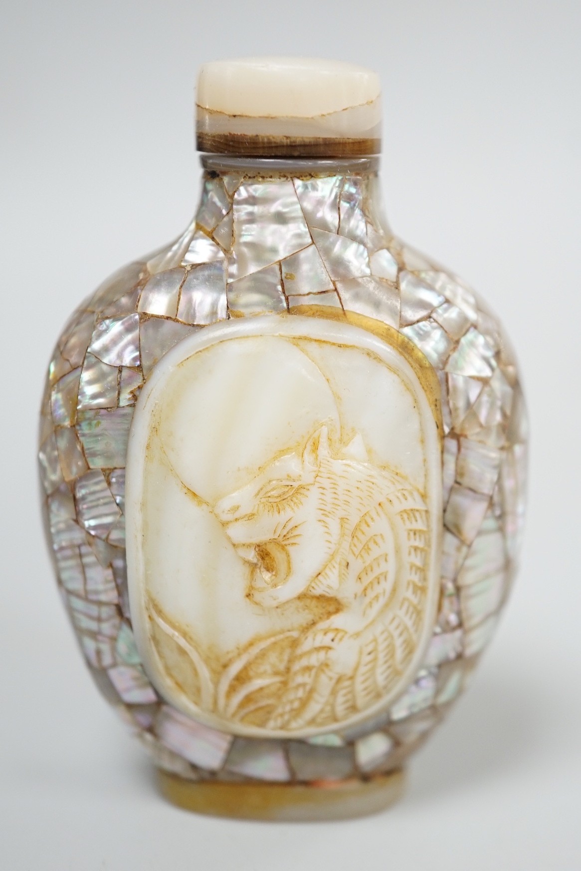 A Chinese shell and mother of pearl snuff bottle, Tongzhi mark probably later, 6.2 cm high including stopper